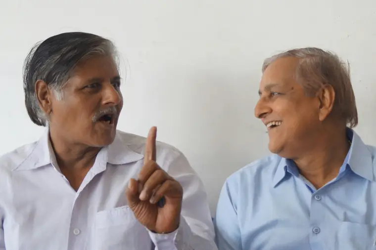 Two men deep in conversation